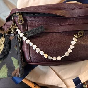 Parker Thatch Sling and Parker Thatch strap along with charms
